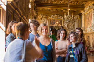 Listening to the guide at Fontainebleau